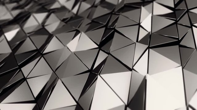 Abstract background with animation of waving smooth polygonal surface from glass, chrome or plastic. Good technological backdrop. Animation of seamless loop. 