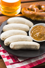 The bavarian weisswurst, pretzel and mustard.