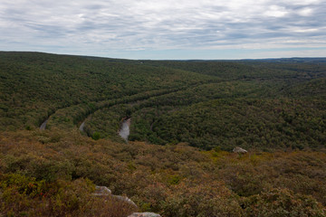 Road, tracks, and river form concentric circles