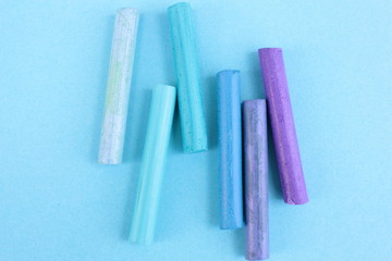 Colored pastel on a blue background