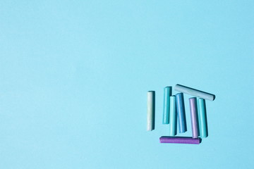Colored pastel on a blue background