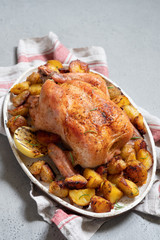 Whole roasted chicken with potato