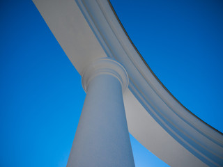 White column on sunny day against the sky