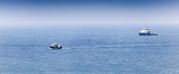 Homecoming: Tired fishermans ship approaching after a hard day