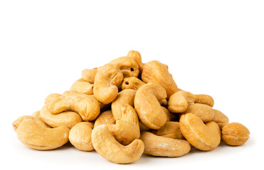 Pile of fried cashew on a white background. Isolated