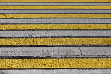 yellow and white pedestrian crossing, zebra