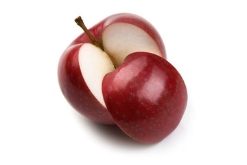 Sliced Red Ripe Fresh Delicious apples, isolated on white background. Close-up.