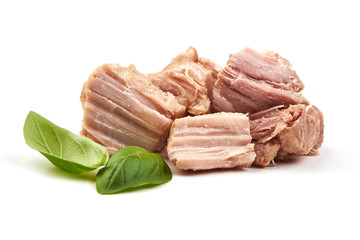 Canned Meat with basil leaves, close-up, isolated on white background