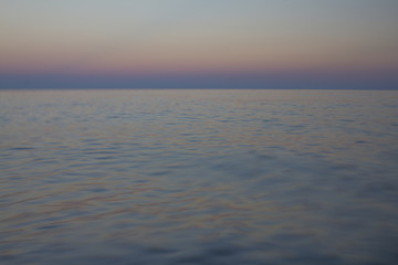 Obraz premium Evening sea at sunset