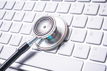 Stethoscope Lying On A Keyboard - Computer Repair Concept