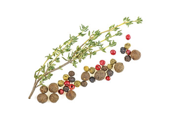 Thyme herb and peppercorns on a white background. Italian herbs and spices.