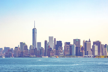 Fototapeta na wymiar Manhattan Downtown Panorama with World Trade Center. New York City panorama with Manhattan Skyline over Hudson River. One World Trade Center and skyscraper. New York cityscape, USA.
