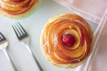 Peach Custard Tart on a Green Pedestal Plate