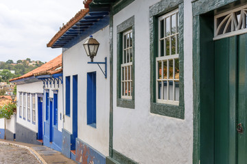 Facade of old street and houses in colonial style in the city of Sabara, Minas Gerais
