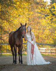 Bride posing with her horse