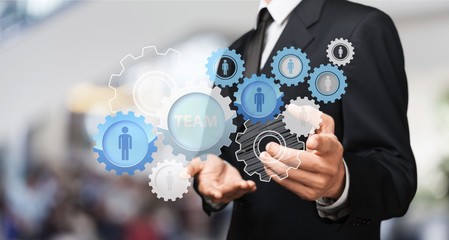 Businessman and  analytics symbol on  background