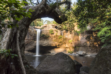 Beautiful waterfall with sunlight in jungle, Haew Suwat Waterfall.