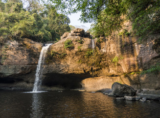 Beautiful waterfall with sunlight in jungle, Haew Suwat Waterfall.