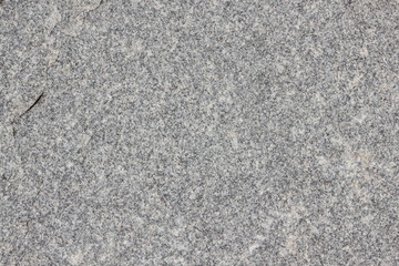 Granite background. Texture of gray granite stone. Natural pattern in gray tones. Abstract background