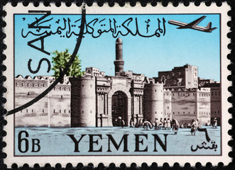 Ancient town gate on old yemeni postage stamp