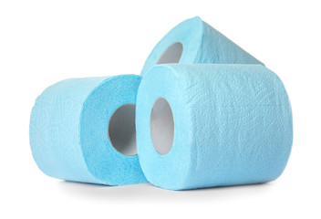 Color toilet paper rolls on white background