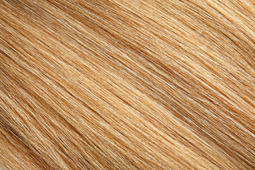 Naklejka premium Texture of healthy blond hair as background, closeup