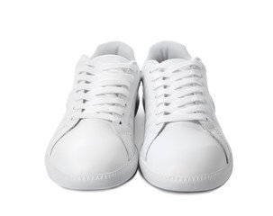 Pair of trendy sneakers on white background