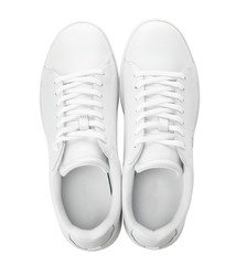 Pair of trendy sneakers on white background, top view