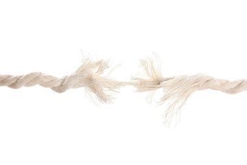 Frayed rope at breaking point on white background