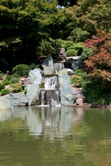 Fototapeta na wymiar Waterfall in park