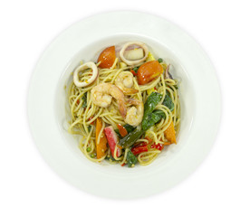 Spaghetti seafood on a white table, Top view with copy space for your text..