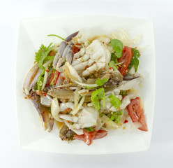 spicy seafood salad In white cups, white backdrop. Top view. Copy Space..
