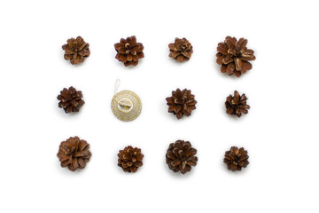 Christmas composition. pine cones, red and golden balls on white background. Flat lay, top view - holidays, winter and celebration concept -