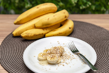 babana with honey and oats. Nutritious and healthy food