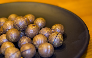 macadamia, Australian nut in a ceramic plate