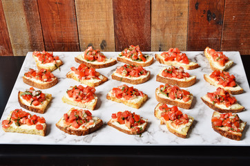 Toast with salsa sauce on buffet table
