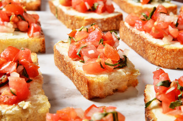 Toast with salsa sauce on buffet table