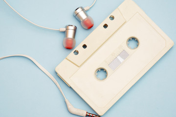 retro cassette from tape recorder with tape and records of the 80s and 90s