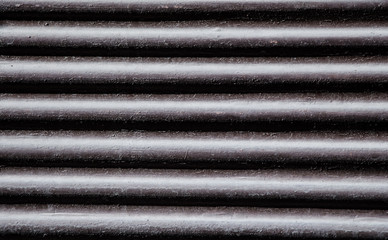 Straight lines on a shop front shutter as a background