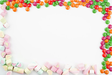 Creative arrangements of confectionery or candies on a white background. Flat lay.