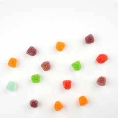 Creative arrangements of confectionery or candies on a white background. Flat lay.