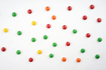 Creative arrangements of confectionery or candies on a white background. Flat lay.