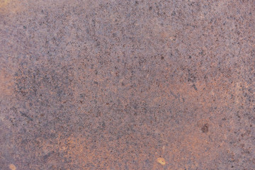 Metal background with streaks of rust. The iron surface rusted spots.