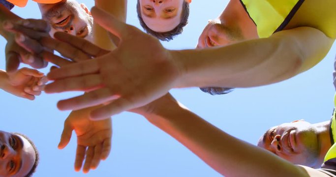 Soccer players forming a huddle 4k
