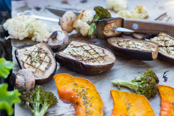 Vegetables grilled, baked, roasted on parchment paper with spices and herbs. Vegan, vegetarian lunch