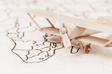 Journey on a small toy wooden plane