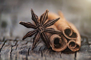 Spices on the wooden floor and black background.