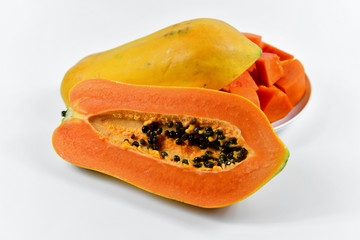 Slice of papaya on white background