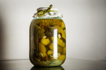 homemade canned cucumbers in glass jar