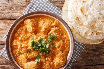 Chicken Changezi - The highly popular dish from the streets of old Delhi close-up on a plate. horizontal top view